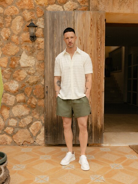 Daniel Fuchs - White Shirt & Olive Shorts Look