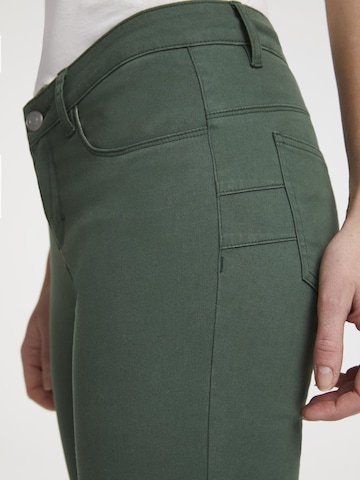 Skinny Pantaloni de la heine pe verde