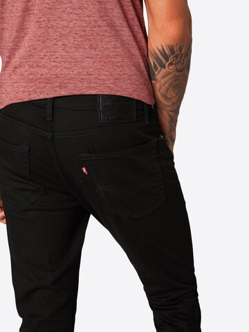 LEVI'S ® Tapered Jeans '513  Slim Taper' in Schwarz