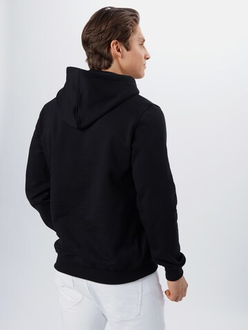 Coupe regular Sweat-shirt 'New York' Starter Black Label en noir