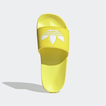 ADIDAS ORIGINALSNatikače s potpeticom 'Adilette' - žuta boja