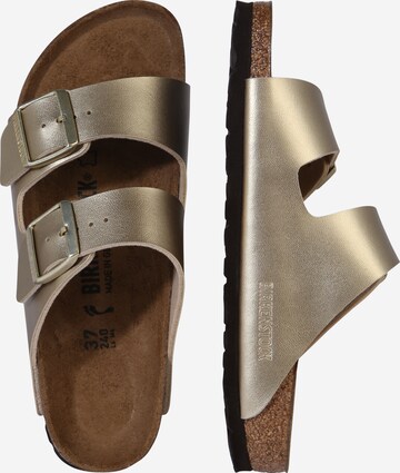 BIRKENSTOCK Pantolette 'Arizona' in Gold