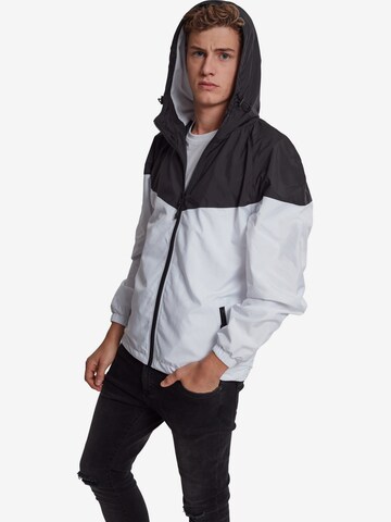 Veste mi-saison Urban Classics en blanc : devant