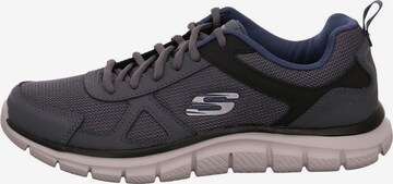 SKECHERS Matalavartiset tennarit 'Track' värissä harmaa