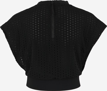 PUMA Functioneel shirt 'Luxe' in Zwart
