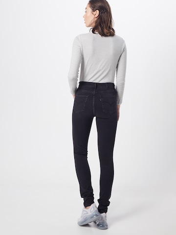 Skinny Jeans '721™ High Rise Skinny' di LEVI'S ® in nero