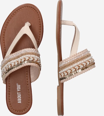 ABOUT YOU T-bar sandals 'Natalie' in Beige: side