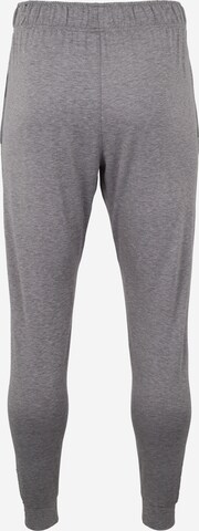 Effilé Pantalon de sport NIKE en gris