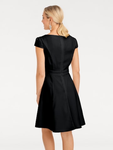 Rochie de cocktail de la heine pe negru