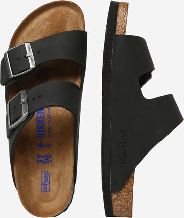 BIRKENSTOCK Muiltjes 'Arizona' in Zwart: zijkant