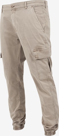 Tapered Pantaloni cu buzunare de la Urban Classics pe bej