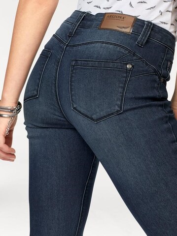 ARIZONA Bootcut Bootcut Jeans Shaping in Dunkelblau ABOUT YOU
