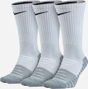 NIKE Athletic Socks in White: front