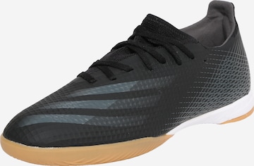 ADIDAS SPORTSWEAR - Zapatillas de fútbol en negro: frente