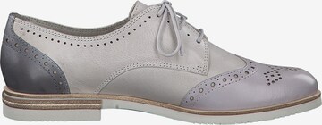 Chaussure à lacets TAMARIS en gris : sur le côté