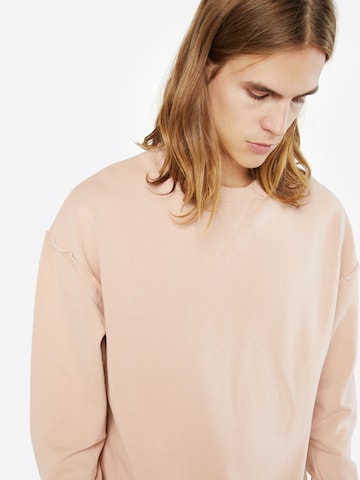 Urban Classics - Sudadera 'Open Edge Crew' en rosa