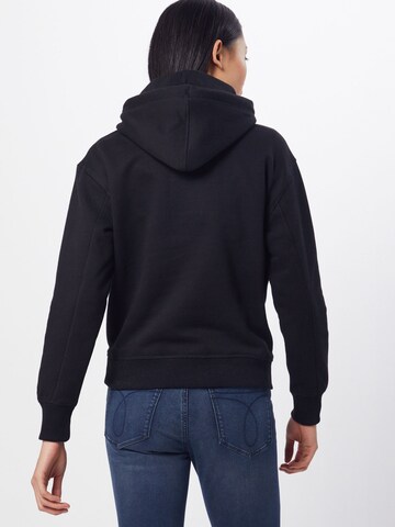 Calvin Klein Jeans Sweatshirt in Schwarz: zadná strana