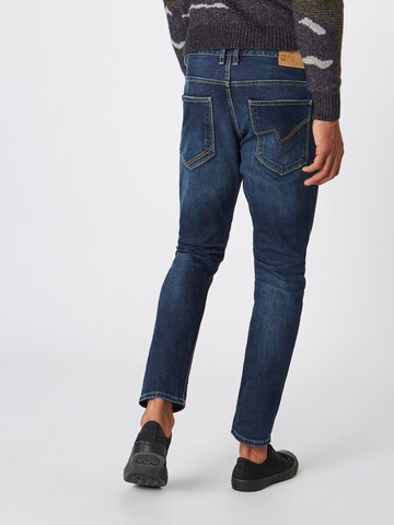 Coupe slim Jean 'Conroy' TOM TAILOR DENIM en bleu : derrière