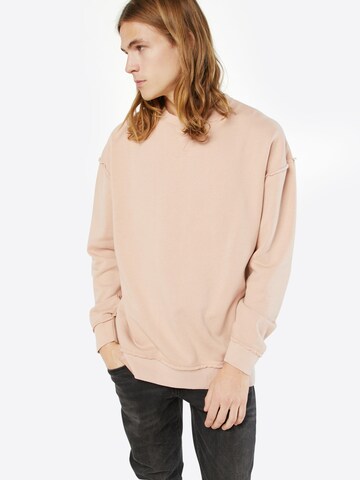 Sweat-shirt 'Open Edge Crew' Urban Classics en rose : devant