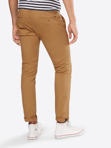 Coupe slim Pantalon chino TOMMY HILFIGER en beige : derrière