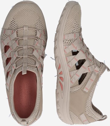 Baskets basses 'Reggae Fest' SKECHERS en beige : sur le côté