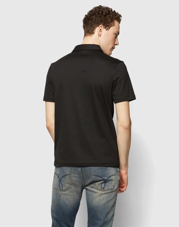 Michael Kors Poloshirt im Flammgarn-Design in Schwarz