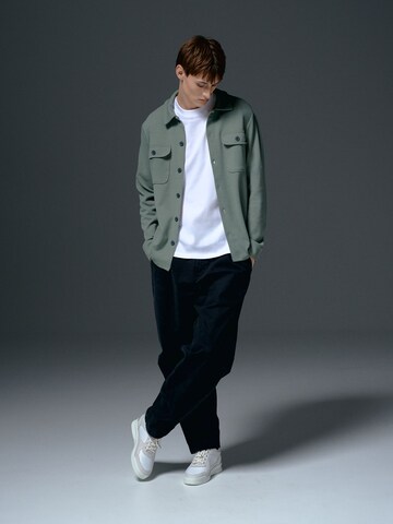 Green Shirt and Dark Denim