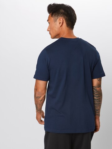 ADIDAS ORIGINALS T-shirt 'Lock Up' i blå