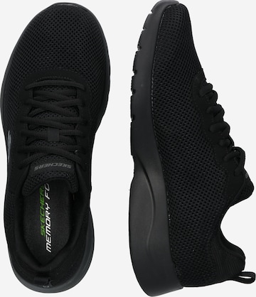 Baskets basses 'Dynamight 2.0' SKECHERS en noir : sur le côté