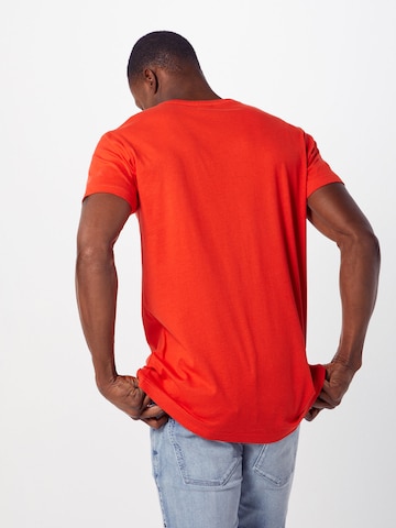 Urban Classics - Camiseta en naranja: atrás