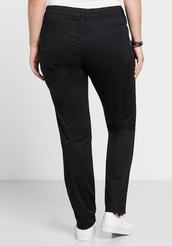 SHEEGO - Slimfit Pantalón en negro