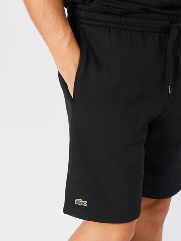 Regular Pantalon Lacoste Sport en noir