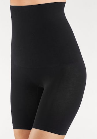 Pantalon modelant PETITE FLEUR en noir : devant