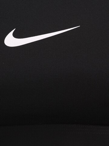 NIKE Korzetová Sportovní podprsenka – černá