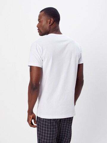 Coupe regular T-Shirt 'Arrow' Urban Classics en blanc : derrière