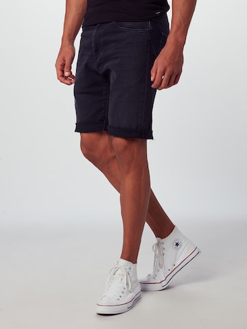 Carhartt WIP Regular Shorts 'Swell' in Schwarz: predná strana