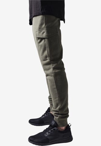 Tapered Pantaloni cargo di Urban Classics in verde