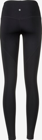 Athlecia Slimfit Tights 'Melasa' in Schwarz