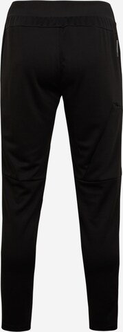 Effilé Pantalon de sport PUMA en noir