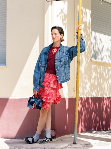 Layering Skirt And Denim Look