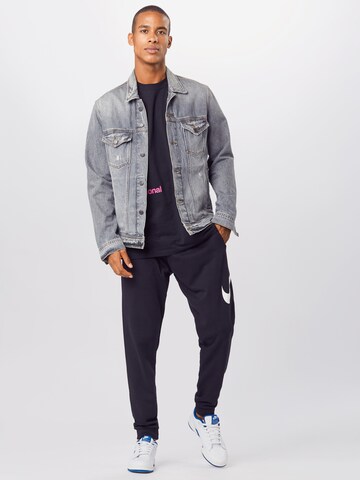 NIKE Tapered Sportsbukser i sort