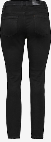 SHEEGO Skinny Jeans in Schwarz