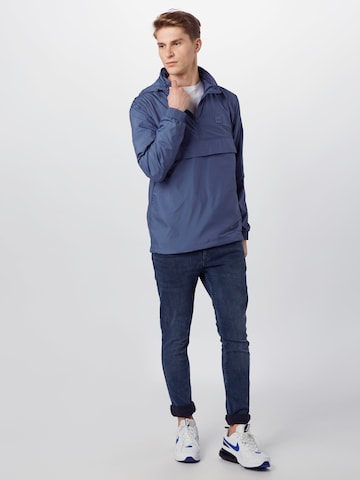 Veste mi-saison Urban Classics en bleu