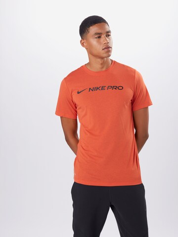 NIKE Regular fit Functioneel shirt 'Pro' in Oranje: voorkant