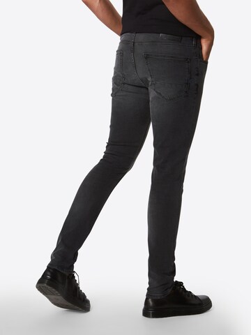 Skinny Jean 'Hero' SCOTCH & SODA en gris : derrière