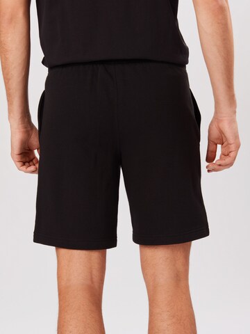 Champion Authentic Athletic Apparel - regular Pantalón en negro