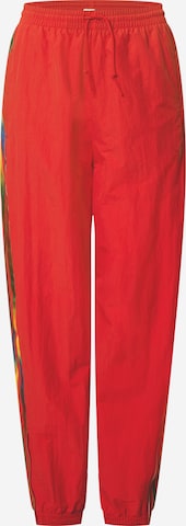 ADIDAS ORIGINALS Tapered Trousers in Red: front