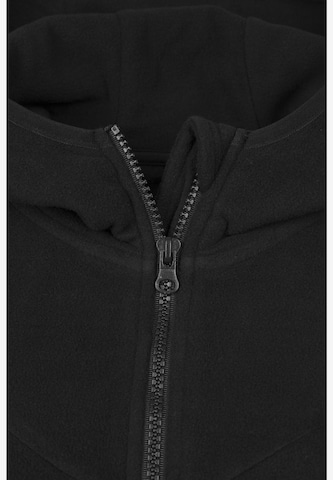 Jachetă  fleece de la Urban Classics pe negru