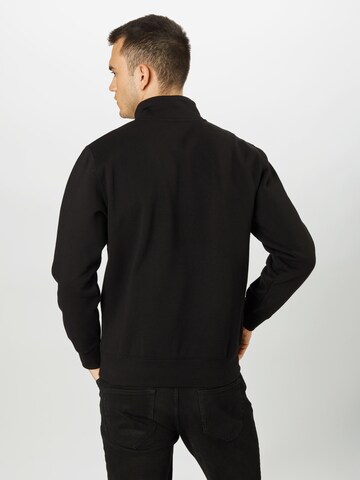 Carhartt WIP Regular fit Sweatshirt 'Chase' in Zwart