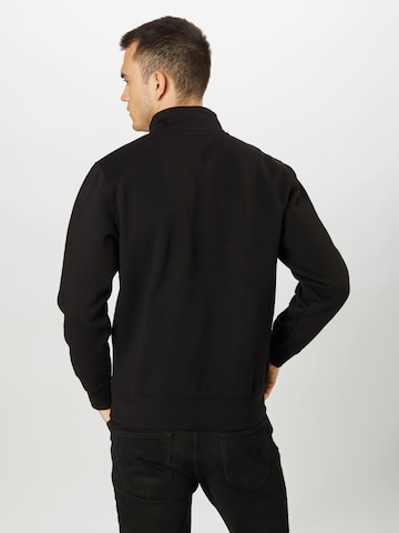 Carhartt WIP Regular fit Sweatshirt 'Chase' in Black